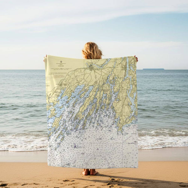 Ocean-inspired fleece blanket featuring nautical chart artwork, offering both comfort and coastal elegance for your home décor.