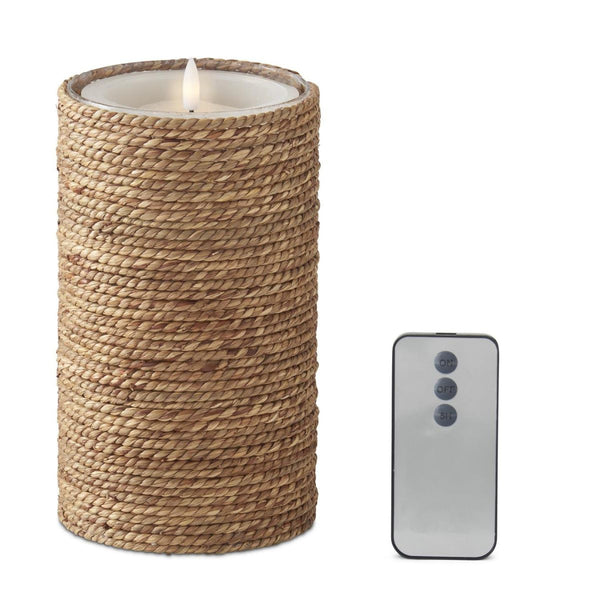 Flameless LED candle in glass with textured jute sleeve, ideal for bedside tables, shelves, or bathroom counters