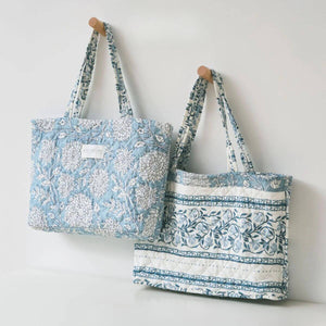 Blue Quilted Tote Bag, 18" x 13" Botanical floral print on one side and a classic stripe-and-vine
