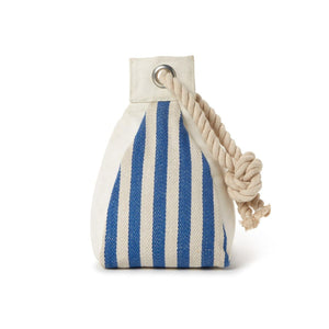 Coastal striped cotton door stop with sand filling and rope handle on hardwood floor