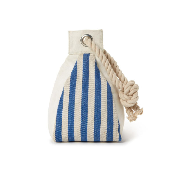 Coastal striped cotton door stop with sand filling and rope handle on hardwood floor