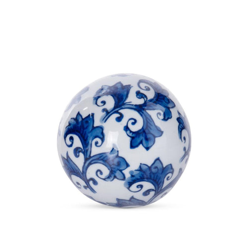 Decorative blue and white ceramic ball with classic floral motif, perfect for bowls, shelves, or tabletop styling.