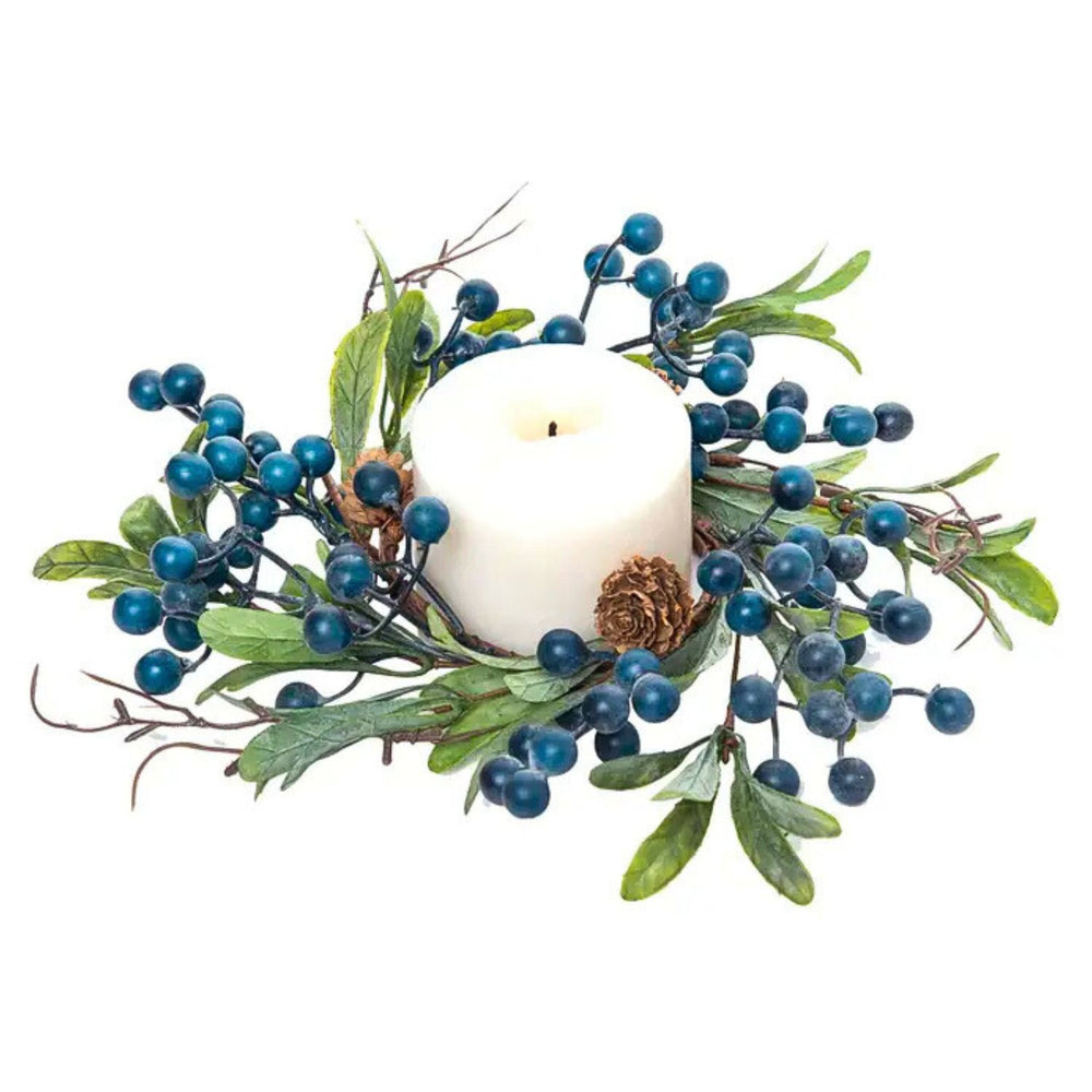 Small decorative wreath featuring blue berries, pinecones, and realistic foliage arranged in a balanced, nature-inspired design. Can be hung or used as a tabletop or centerpiece accent.