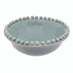 Large blue ceramic bowl with raised beaded rim, 8 inch diameter.
