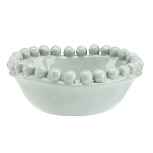 Medium blue ceramic bowl with beaded edge detail, 5 inch diameter.