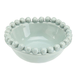 Medium blue ceramic bowl with beaded edge detail, 5 inch diameter.