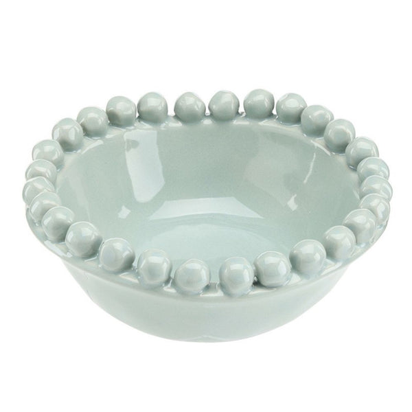 Medium blue ceramic bowl with beaded edge detail, 5 inch diameter.