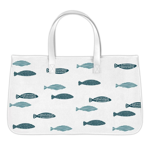 Canvas tote bag with blue fish pattern and sturdy handles