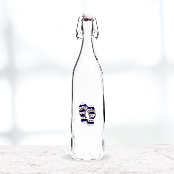 Hand-jeweled flip-flop bottle displayed as coastal home décor accent.