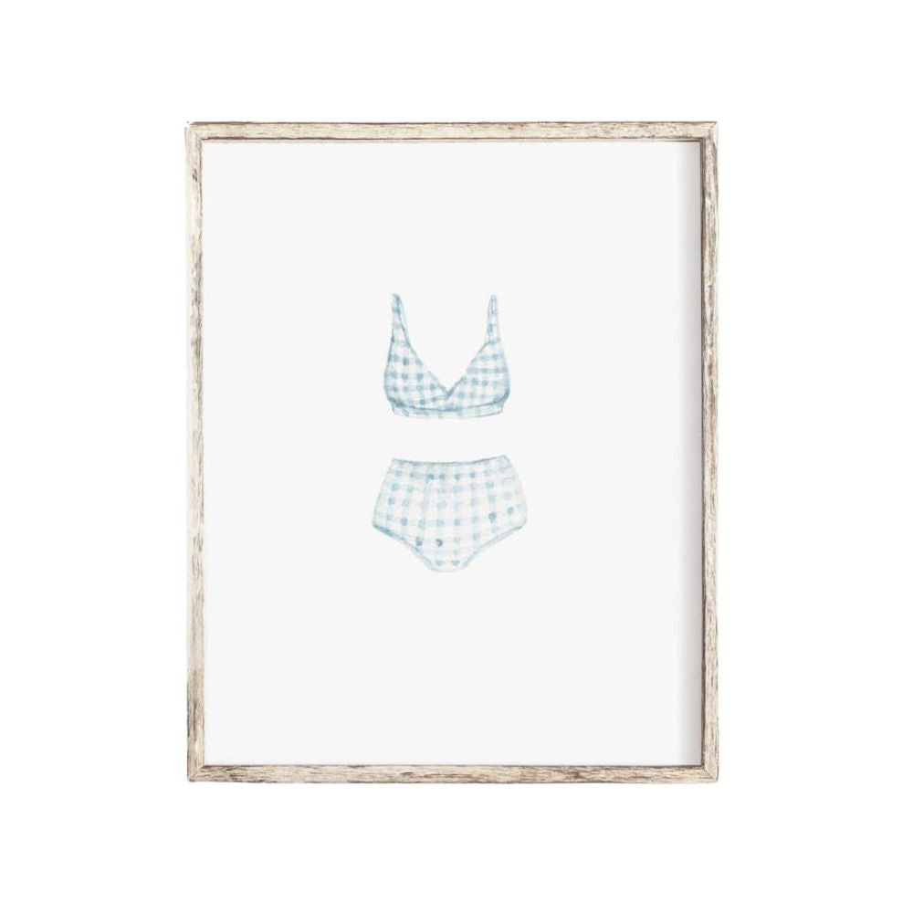 Watercolor art print of a vintage blue gingham swimsuit, evoking coastal nostalgia and seaside charm, unframed with chipboard backing, ready to gift or display.