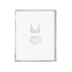 Watercolor art print of a vintage blue gingham swimsuit, evoking coastal nostalgia and seaside charm, unframed with chipboard backing, ready to gift or display.
