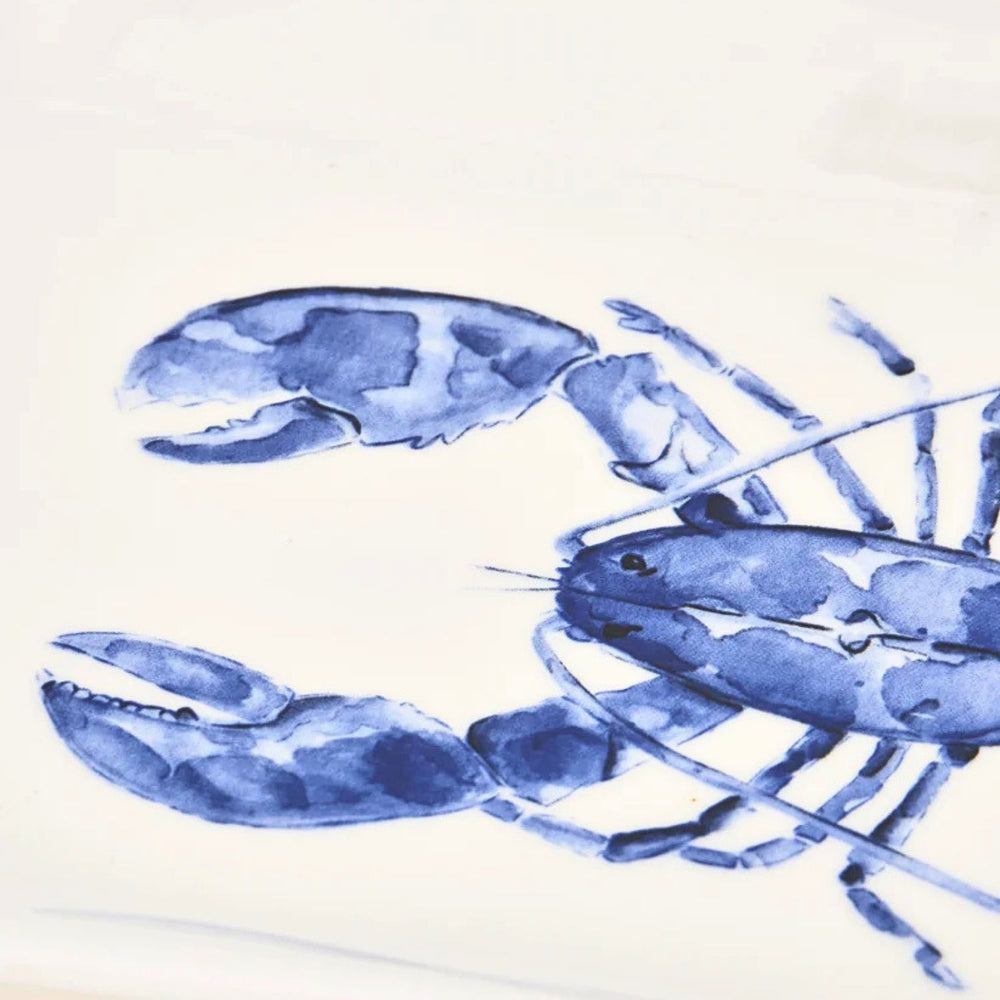 A rectangular white ceramic tray with a centered blue watercolor lobster and a subtle wavy rim.