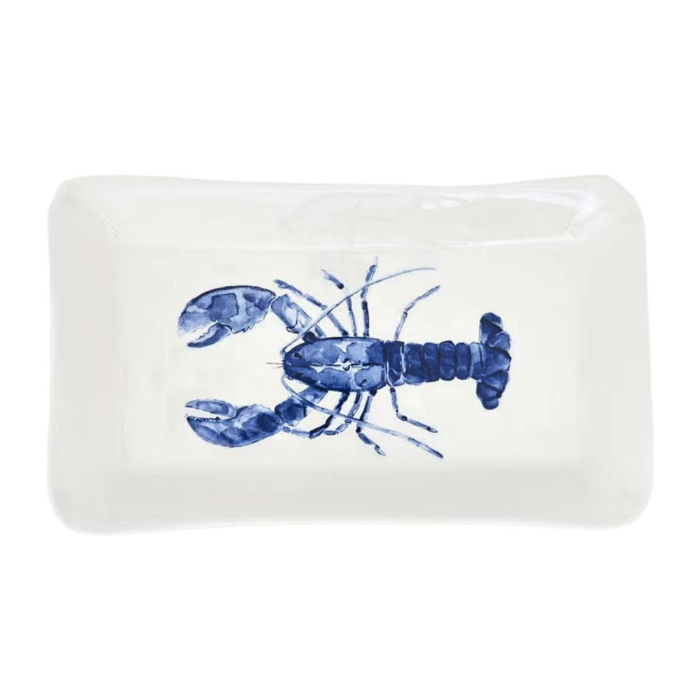 A rectangular white ceramic tray with a centered blue watercolor lobster and a subtle wavy rim.