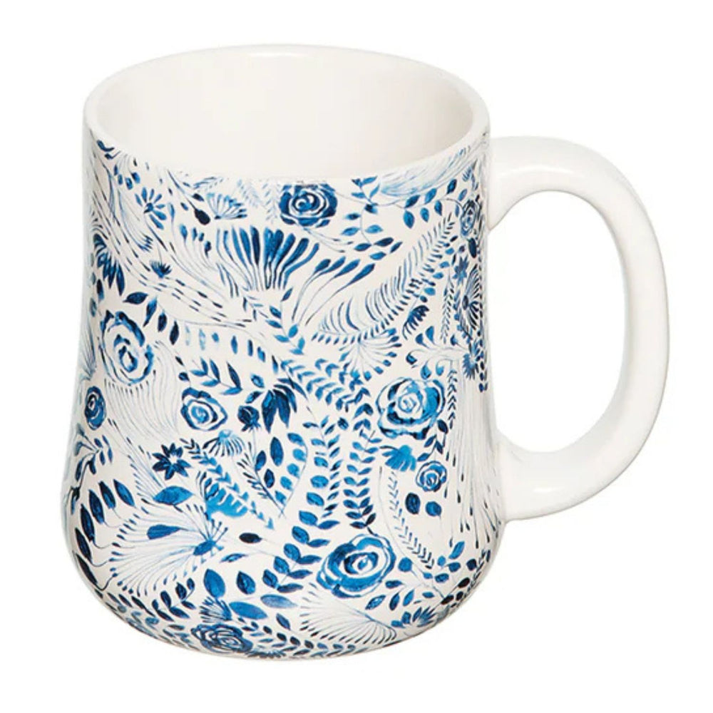 White coastal coffee mug with blue floral pattern on a white background