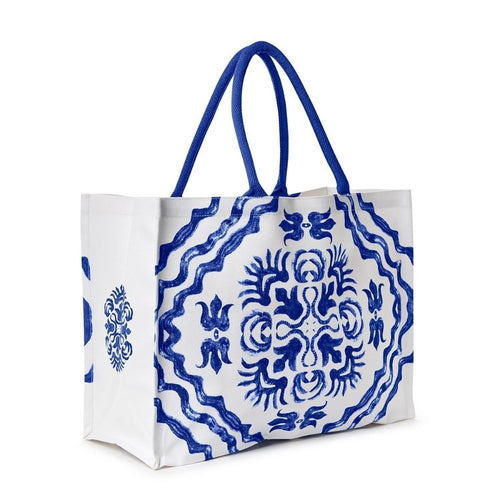 Handcrafted cotton canvas tote bag with blue tile block print, spacious interior, zippered pocket, and sturdy handles, perfect for coastal style and everyday use.