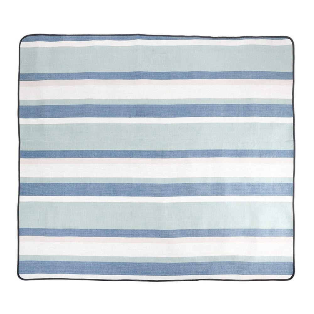 Large blue striped picnic blanket spread open for outdoor use