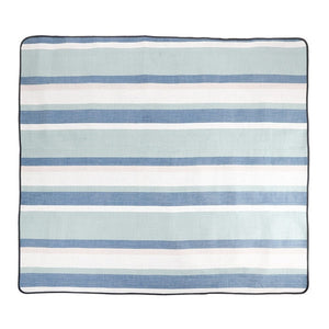 Large blue striped picnic blanket spread open for outdoor use
