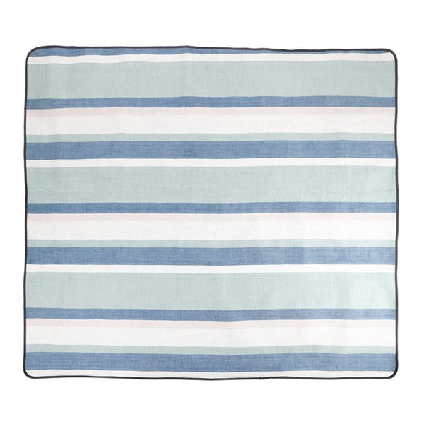 Large blue striped picnic blanket spread open for outdoor use