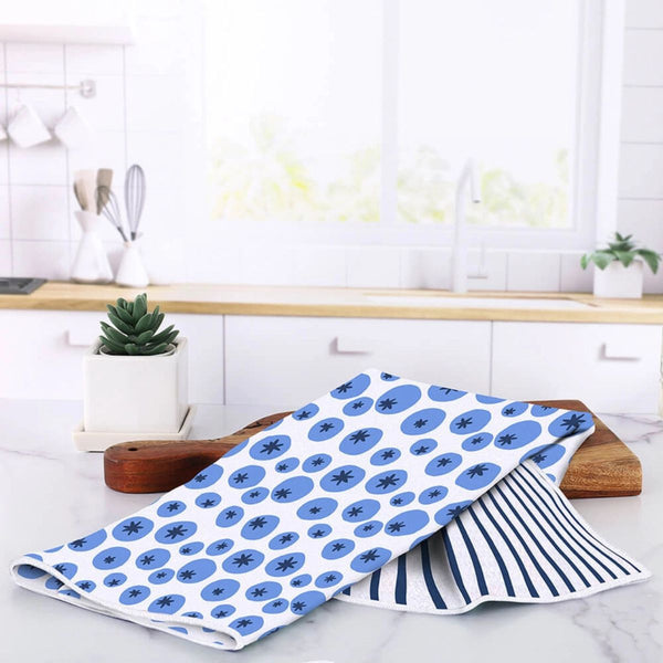 Coastal eco-friendly tea towel made from recycled plastic bottles, featuring a textured waffle weave microfiber that is soft, durable, and quick drying.