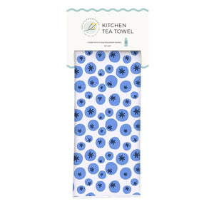 High-performance coastal-inspired tea towel made from recycled plastic bottles, super absorbent and quick drying, supporting ocean conservation efforts.