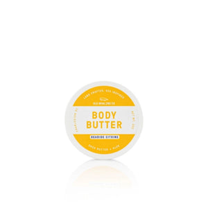 Moisturizing Seaside Citrine® body butter in a compact jar, perfect for coastal air–inspired freshness.