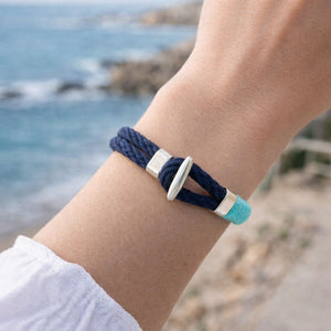 Handmade cotton rope bracelet with silver accents, perfect for casual or work outfits