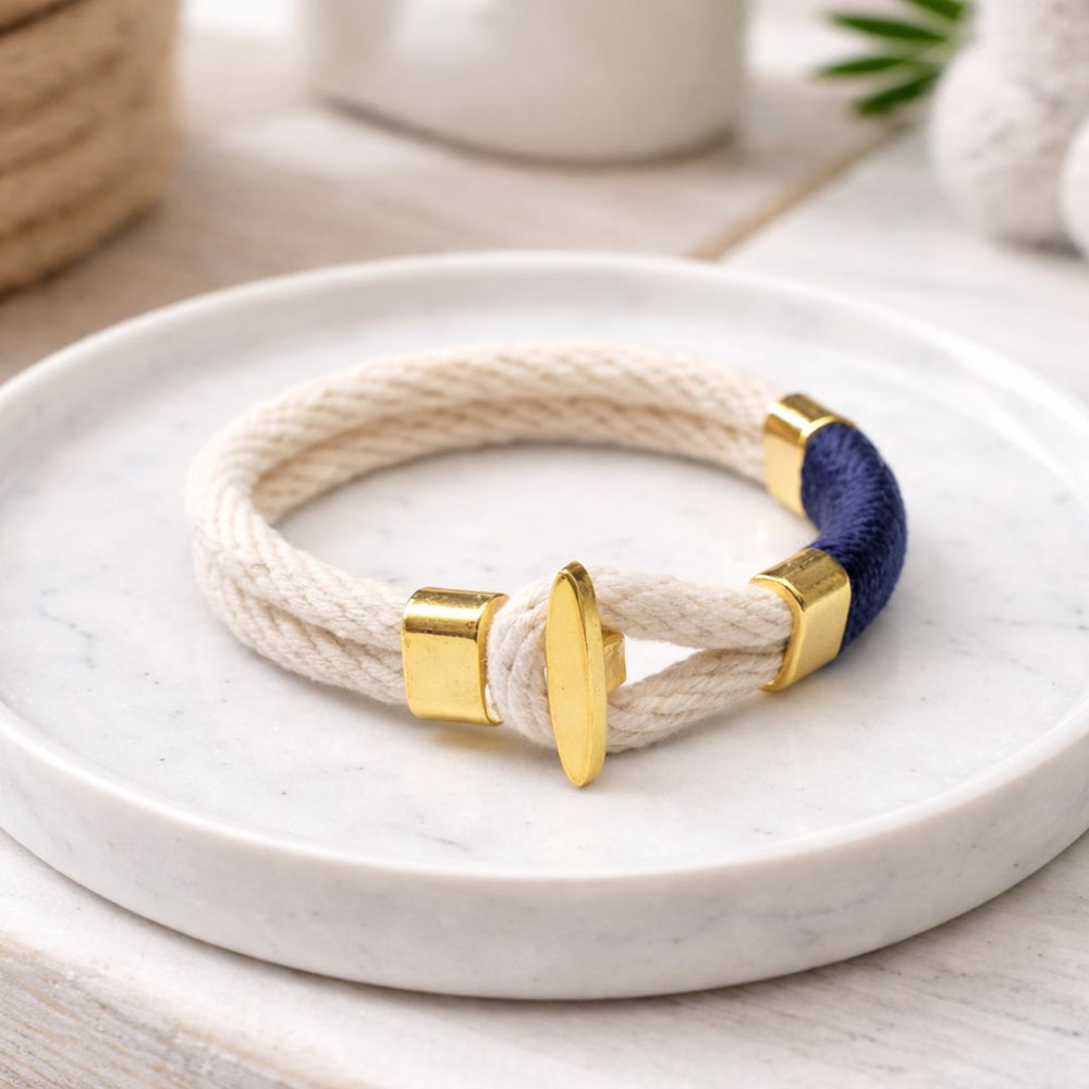 Handcrafted cotton rope bracelet with gold t-bar closure, perfect for gifting or casual nautical outfits.