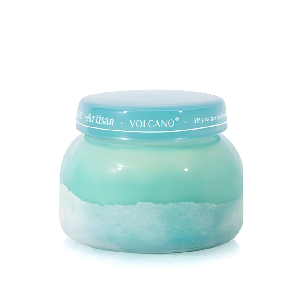 Soy-blend Volcano wax candle with bright citrus and sweet notes, poured in a teal glass jar, 19 oz.