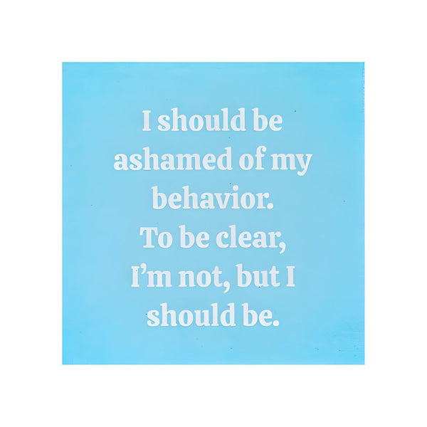 Blue paper cocktail napkin with humorous phrase styled for bar cart or party