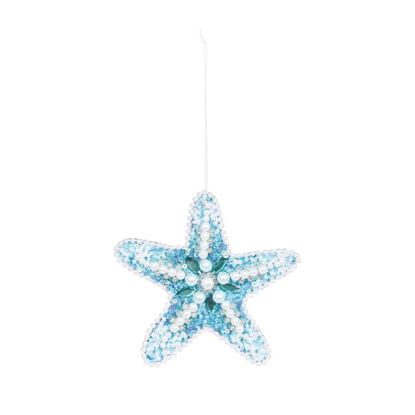 Beaded sea star Christmas ornament in aqua and white with pearl accents and jute hanger, adding a coastal-inspired sparkle to holiday décor.