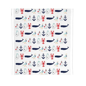 Organic cotton tea towel featuring a hand-drawn New England coastal summer illustration, lightweight and soft for everyday use.