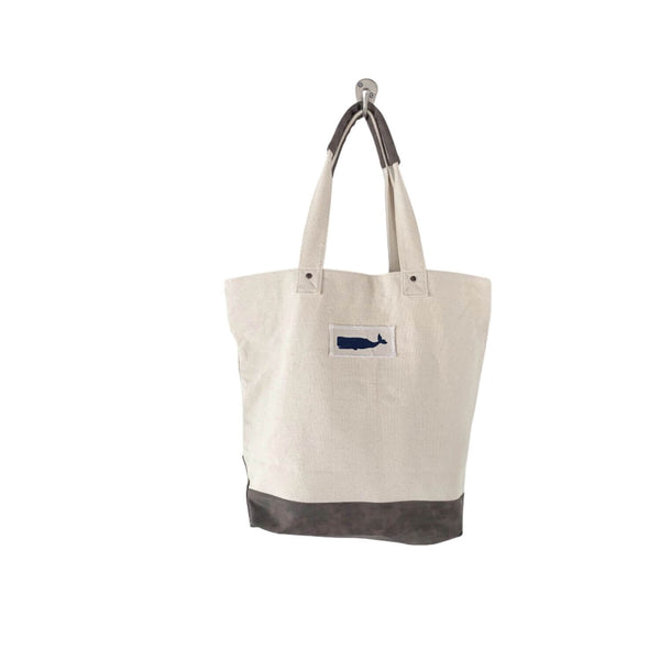 Lightweight nautical canvas and jute tote bag with a coastal whale design, ideal for beach days, markets, or daily use.