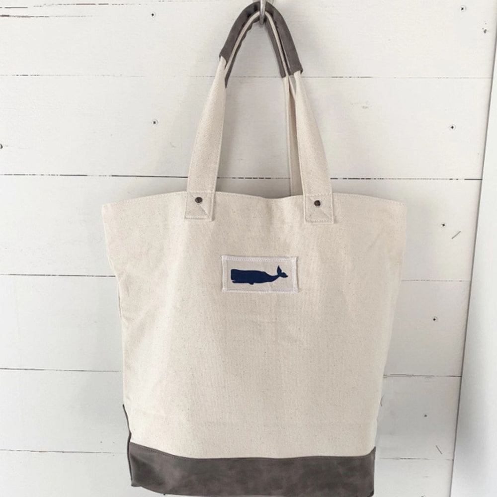 Lightweight nautical canvas and jute tote bag with a coastal whale design, ideal for beach days, markets, or daily use.