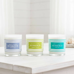Hand-poured candle in a sleek white glass tumbler, perfect for gifting or adding a serene coastal touch to your home.