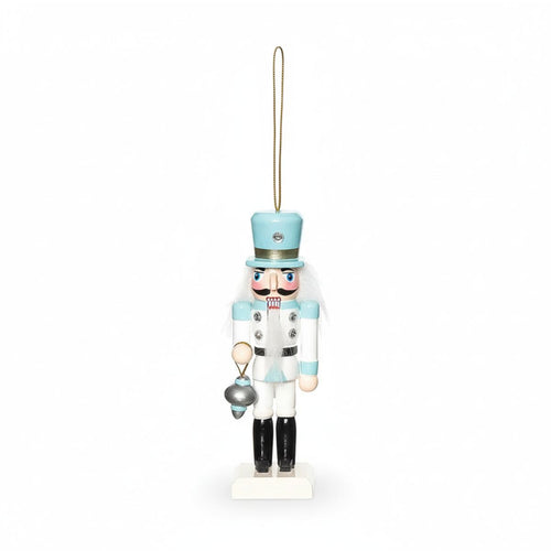 Light blue coastal nutcracker ornament with hanging loop, featuring silver accents, perfect for coastal living décor