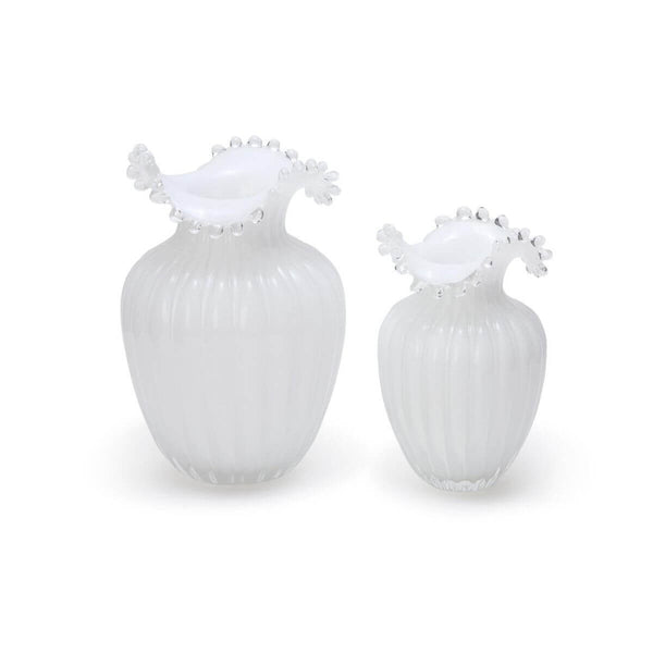 Decorative white glass vases with pearlescent shine, adding a touch of sophistication to any room