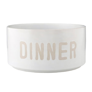 Stoneware pet bowl with debossed “Dinner” text