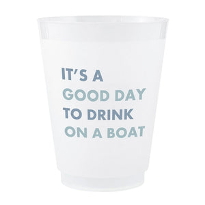 Close-up of frosted 16 oz cup with coastal blue “It’s a Good Day to Drink on a Boat” lettering