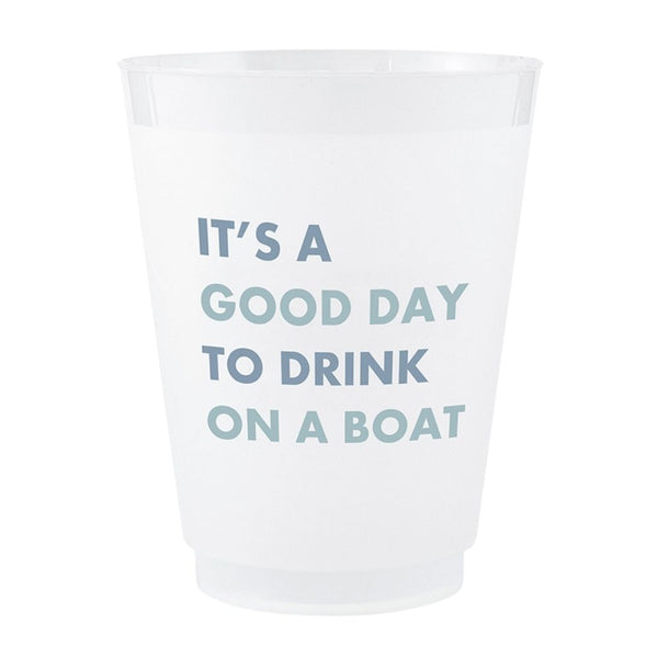 Close-up of frosted 16 oz cup with coastal blue “It’s a Good Day to Drink on a Boat” lettering
