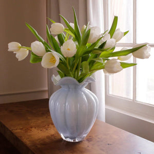 Large periwinkle blue glass vase with a hand-painted interior, showcasing subtle variations that make each piece unique.