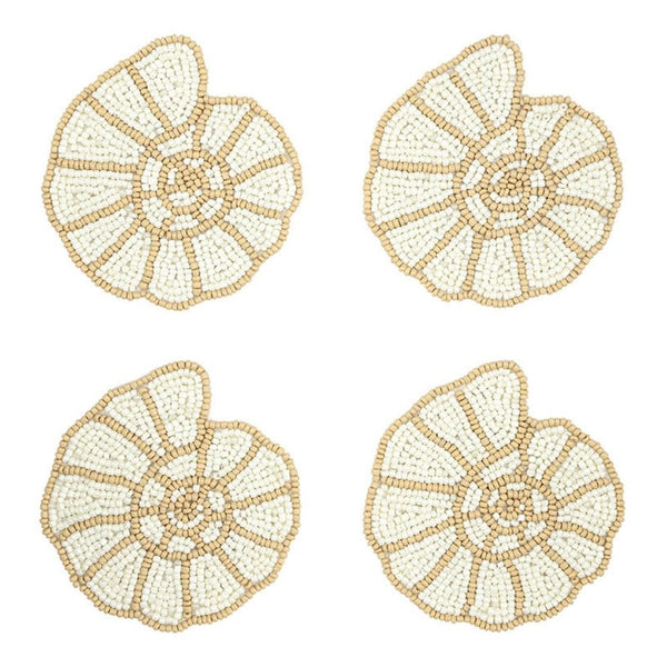 Set of four shell-shaped glass bead coasters arranged on a white background