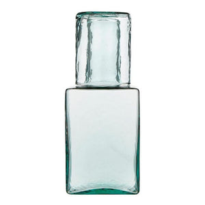 Hammered recycled glass carafe with matching tumbler lid on top