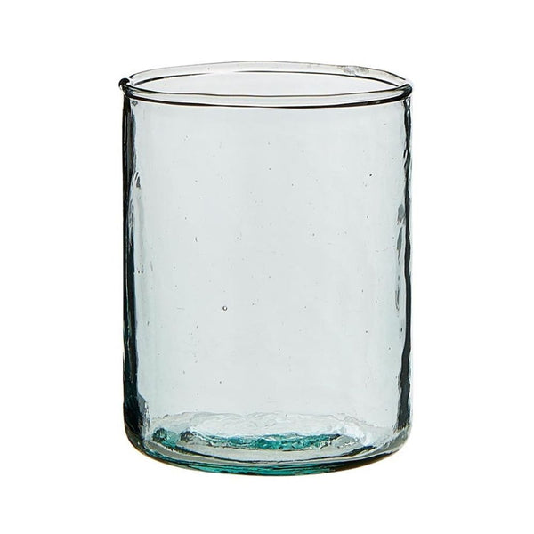Matching tumbler lid of a hammered recycled glass carafe 