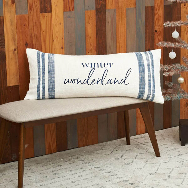“Soft cotton pillow with striped design and cheerful winter script, ideal for layering or gifting.”