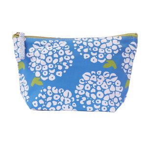 Coastal-inspired medium cotton canvas organizer pouch with playful print, gold metal zipper, and printed looped zipper pull.