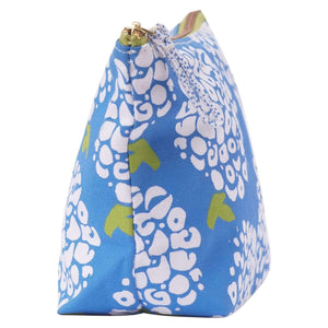 Colorful coastal canvas zip pouch ideal for storing cosmetics or small essentials, accented with a gold metal zipper