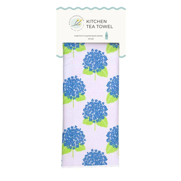 Coastal sustainable microfiber tea towel with blue hydrangea print on white background, folded