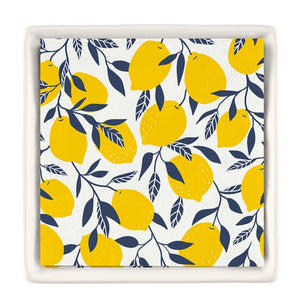Lemon cocktail napkin set inside a ceramic tray