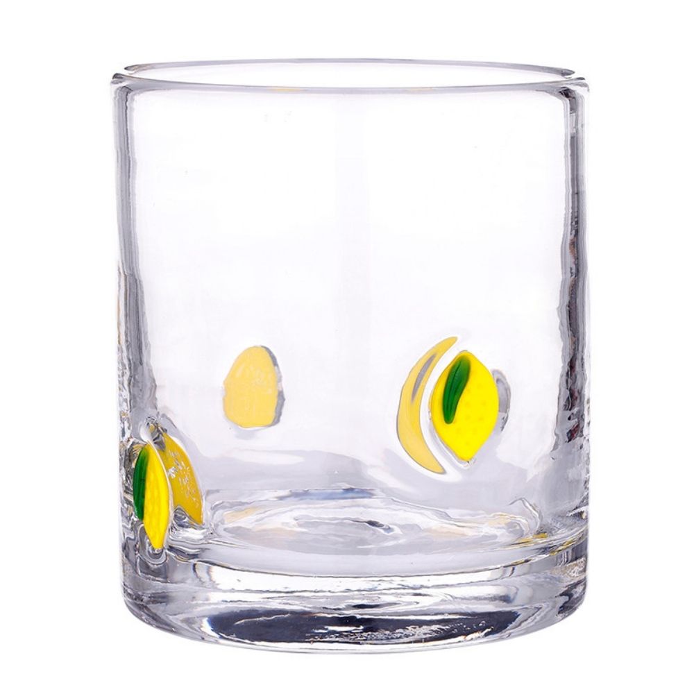 Double old fashioned glass with lemon illustrations on clear glass for cocktails or whiskey