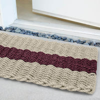 Thumbnail for Lobster Rope Doormats, Outdoor Door Mats, Wicked Good Door Mats Made in Maine, Dark Tan with Cranberry Stripe, Angled View in Front Door